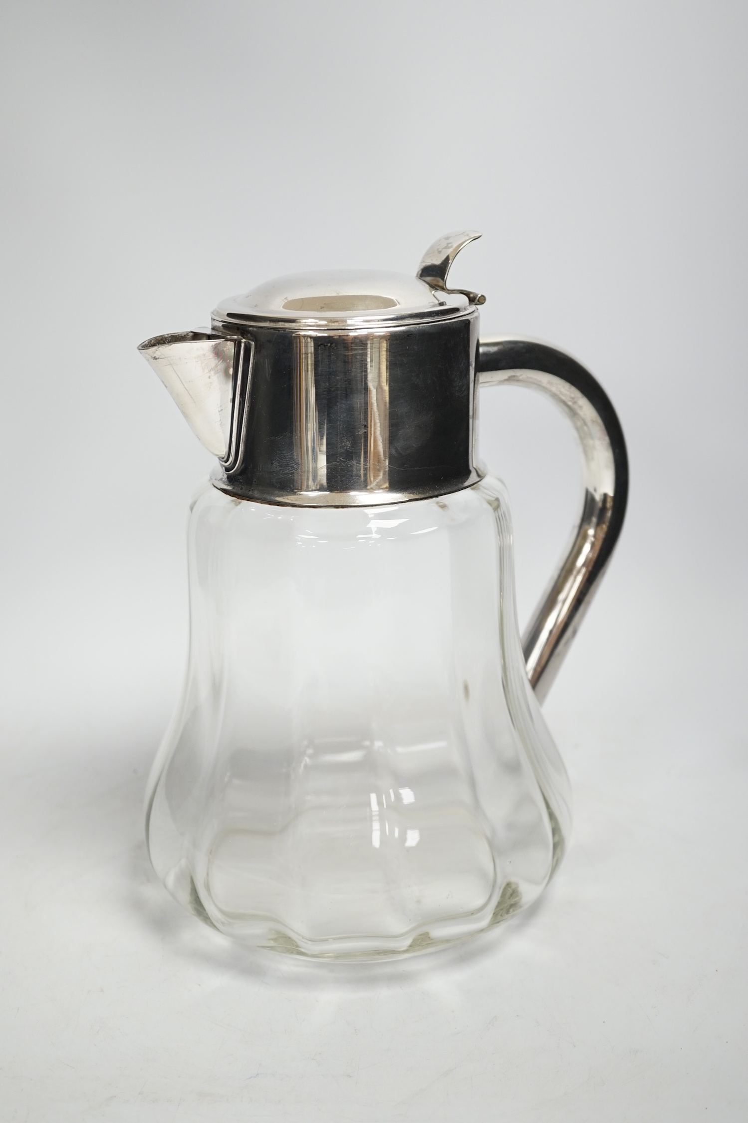 A silver plated mounted lemonade jug, 27cm high